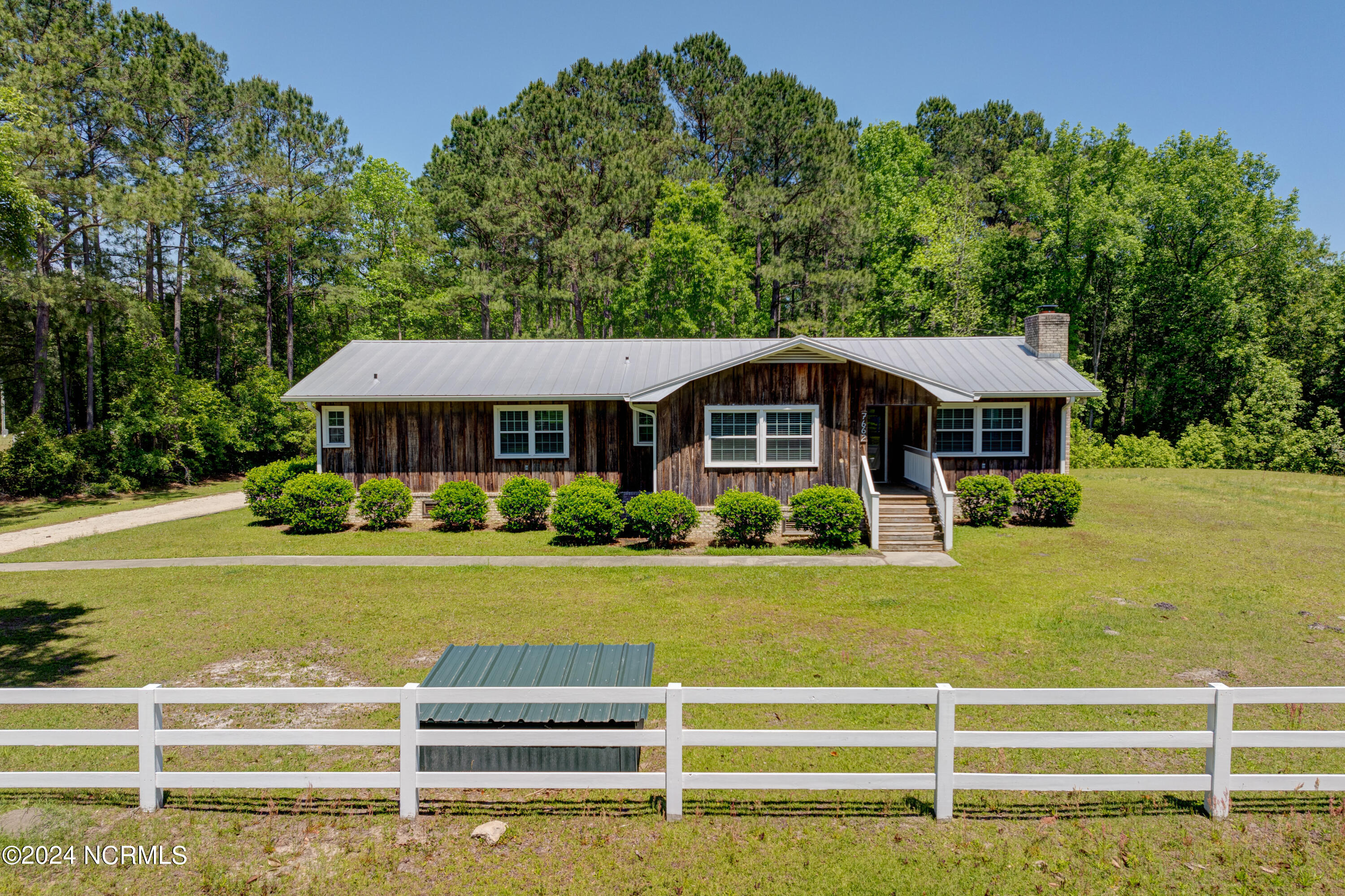 7662 Funston Road Southeast Winnabow, NC 28479 - Photo 1 of 25 7662FunstonDrone-1
