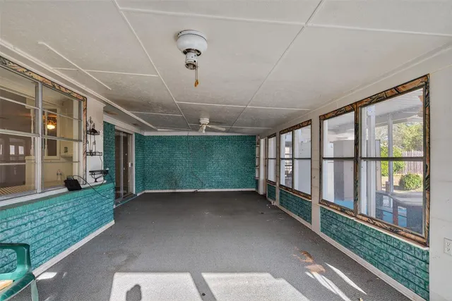 a view of a room with windows