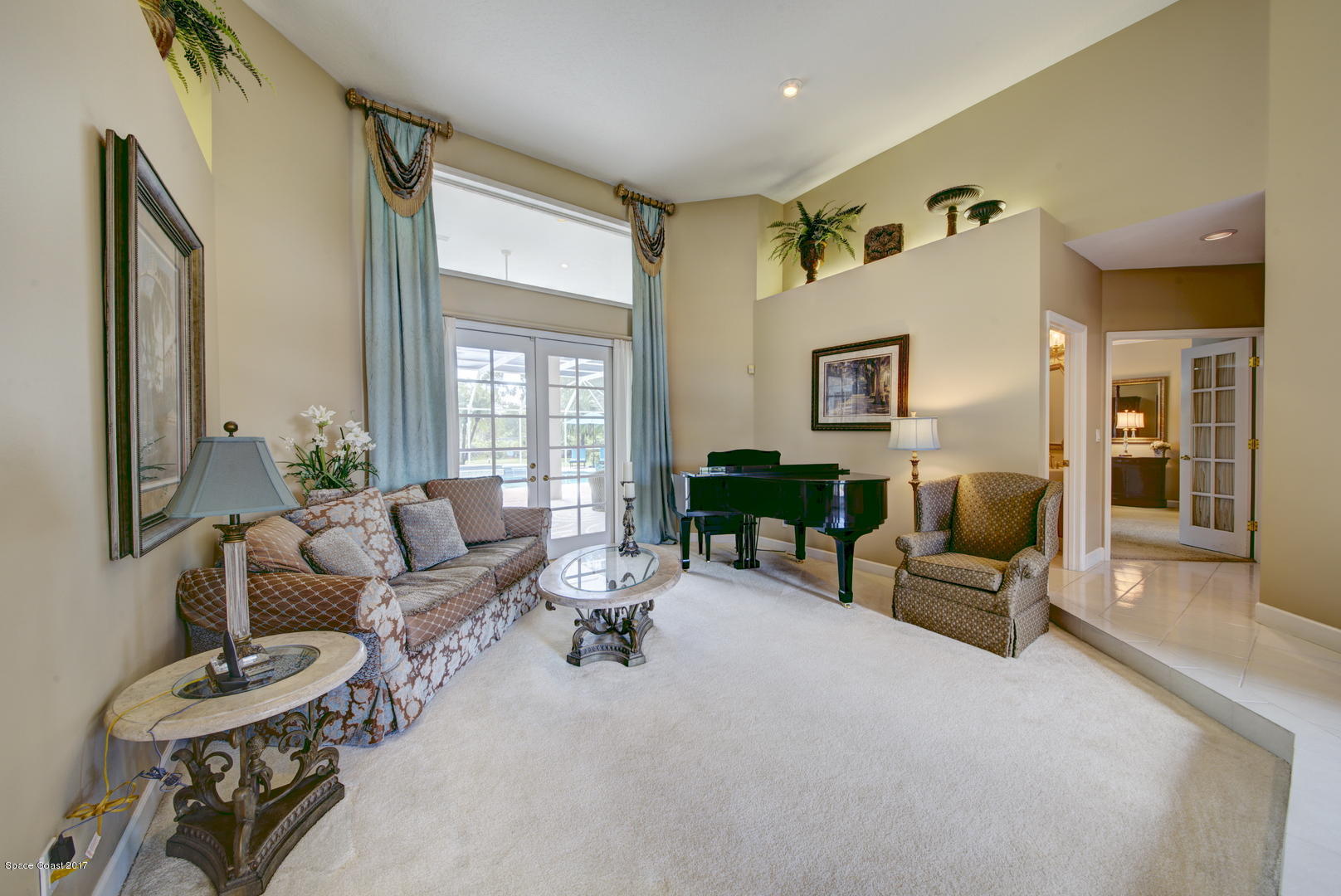 3755 Big Pine Road Melbourne, FL 32934 - Photo 16 of 73 Living Room with French Doors to Patio