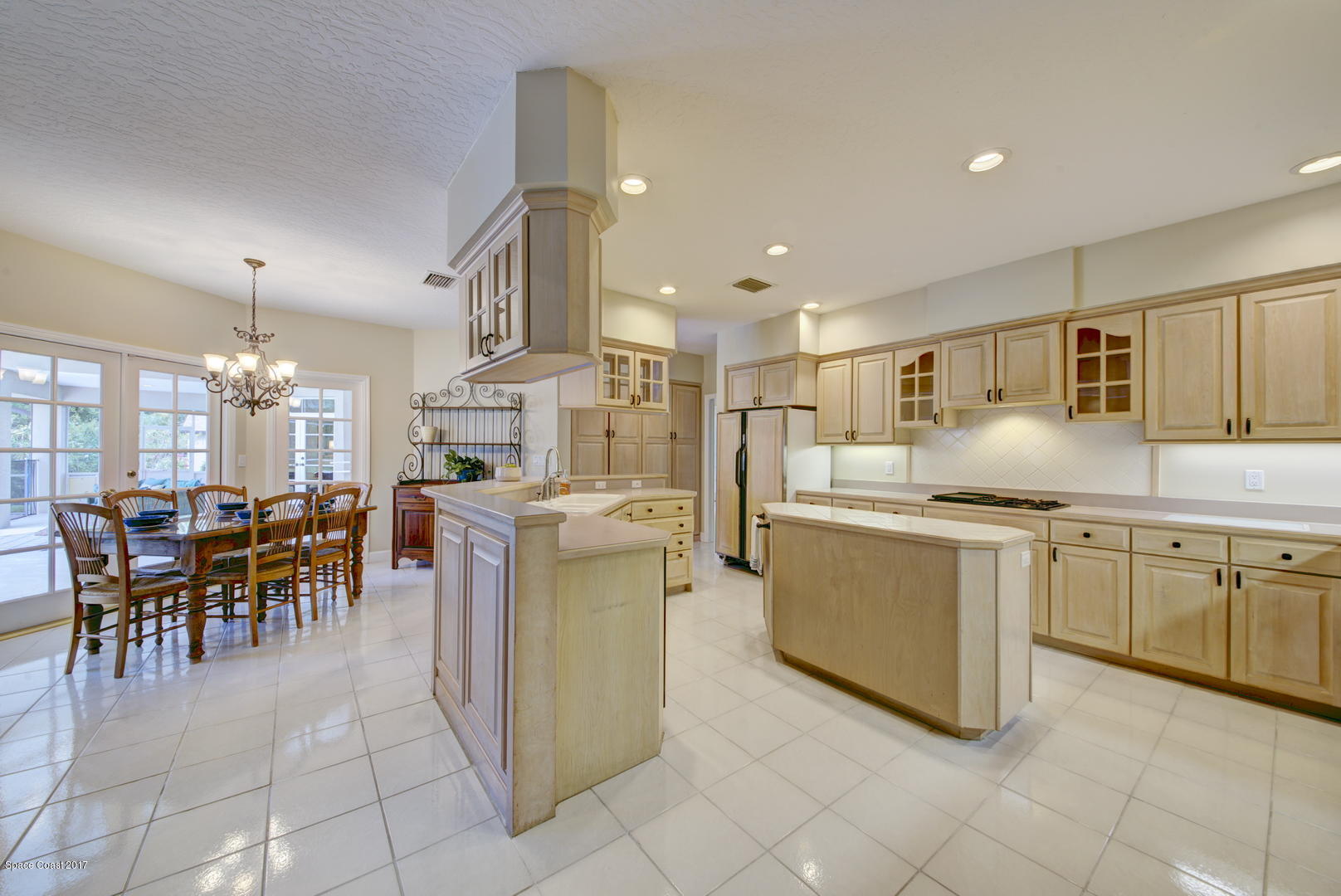 3755 Big Pine Road Melbourne, FL 32934 - Photo 27 of 73 Kitchen with Custom Cabinets