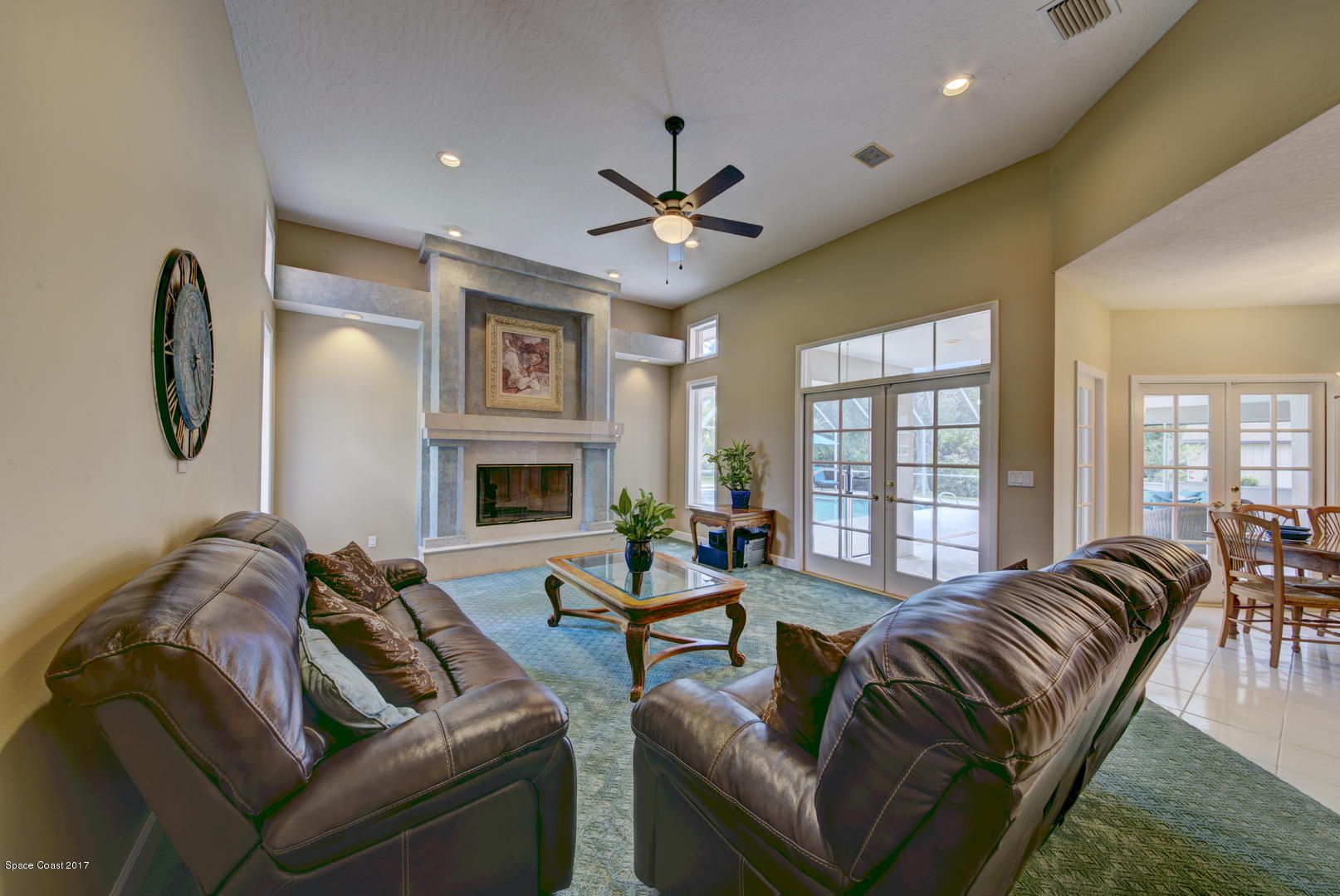3755 Big Pine Road Melbourne, FL 32934 - Photo 30 of 73 Family Room access to Patio