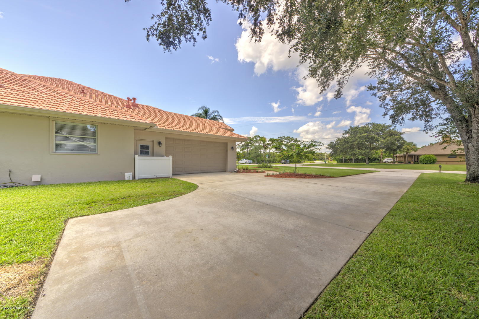 3755 Big Pine Road Melbourne, FL 32934 - Photo 8 of 73 Two Car Garage with Extra long driveway