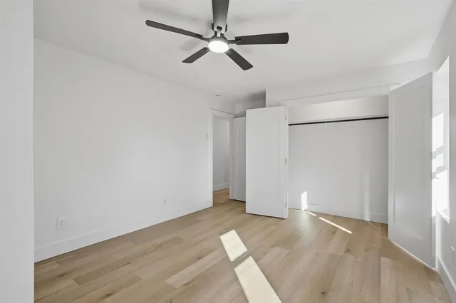 a bathroom with a double vanity sink a mirror and shower