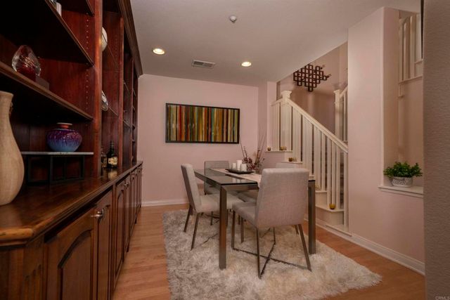 a view of a dining room with furniture
