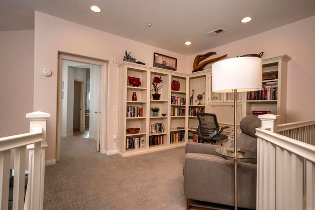 a view of a livingroom with furniture and window