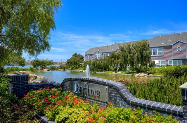a view of a lake with a garden