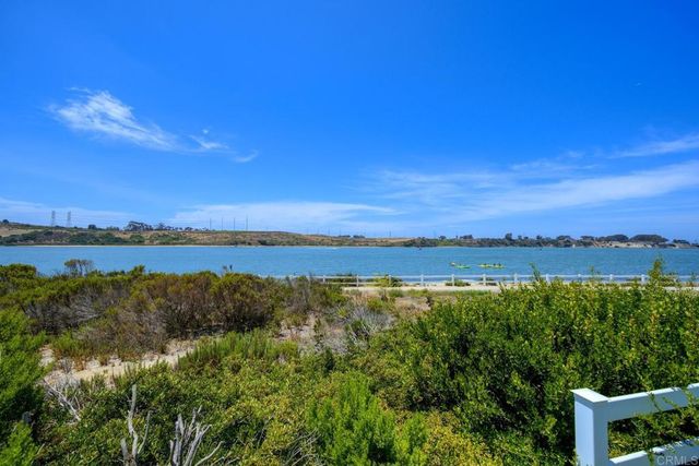 a view of lake and mountain