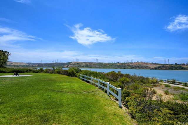 a view of a city with mountains in the background