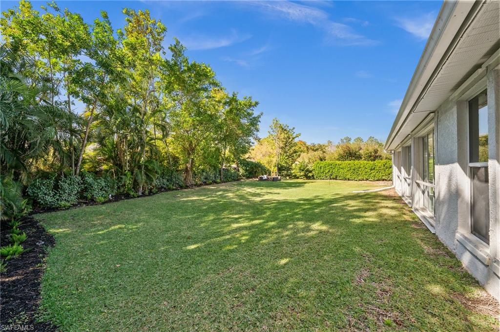 6857 Mill Run Road Naples, FL 34109 - Photo 41 of 49 View of yard