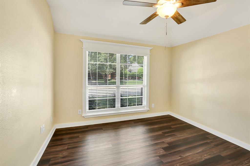 1315 Ballantrae Drive Allen, TX 75013 - Photo 20 of 26 a view of wooden floor and windows in a room