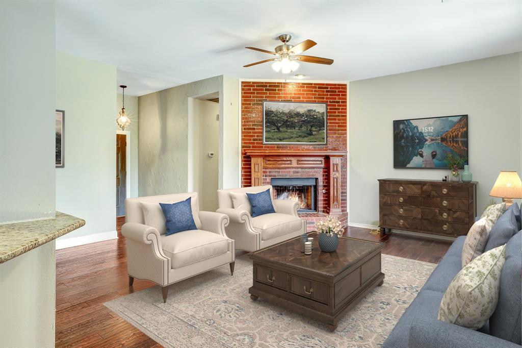 1315 Ballantrae Drive Allen, TX 75013 - Photo 3 of 26 a living room with furniture and a fireplace