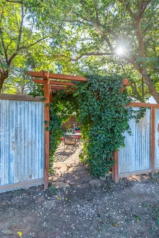 a backyard of a house with seating space