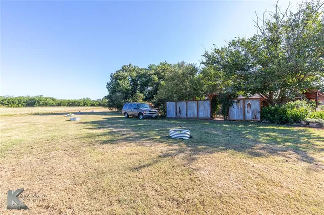 a view of a park with swings