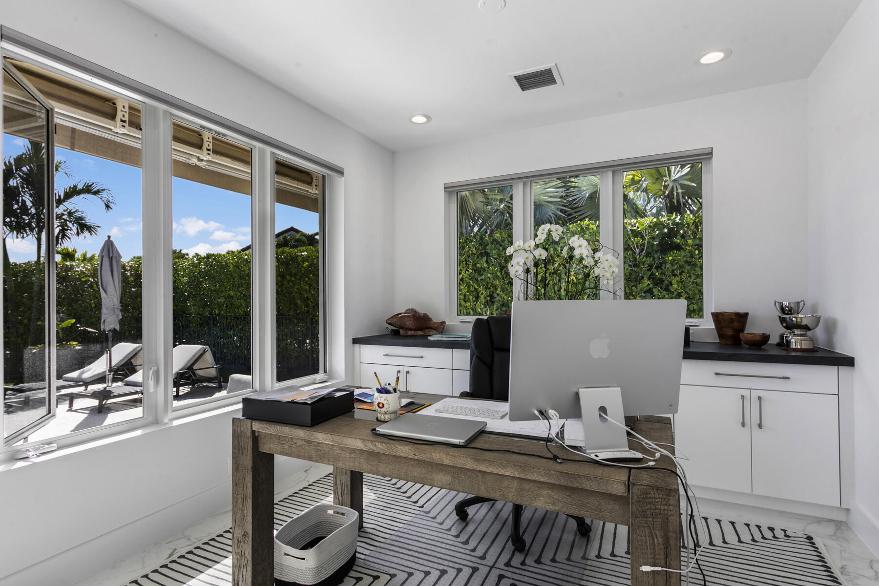 245 Regatta Drive Jupiter, FL 33477 - Photo 20 of 51 a workspace with furniture and a window