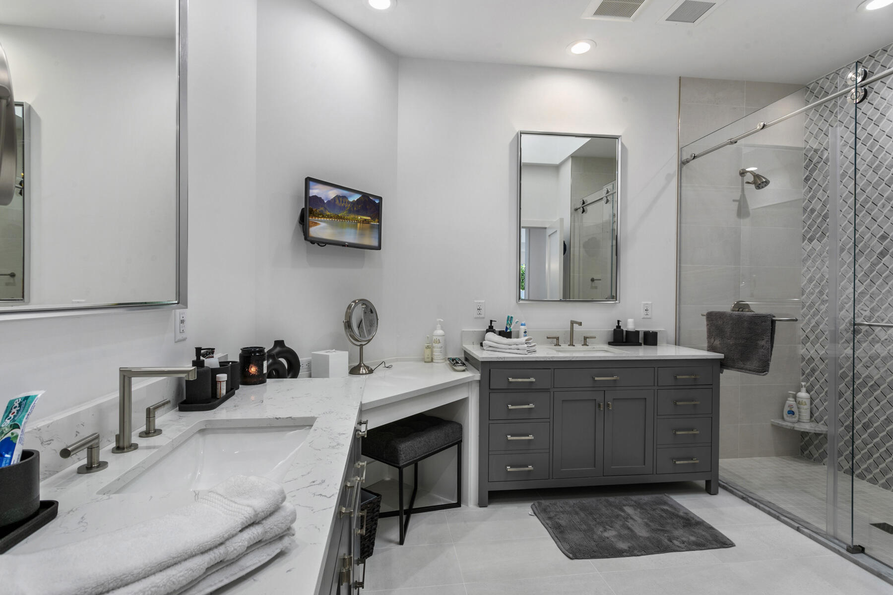 245 Regatta Drive Jupiter, FL 33477 - Photo 22 of 51 a room with a sink and a mirror