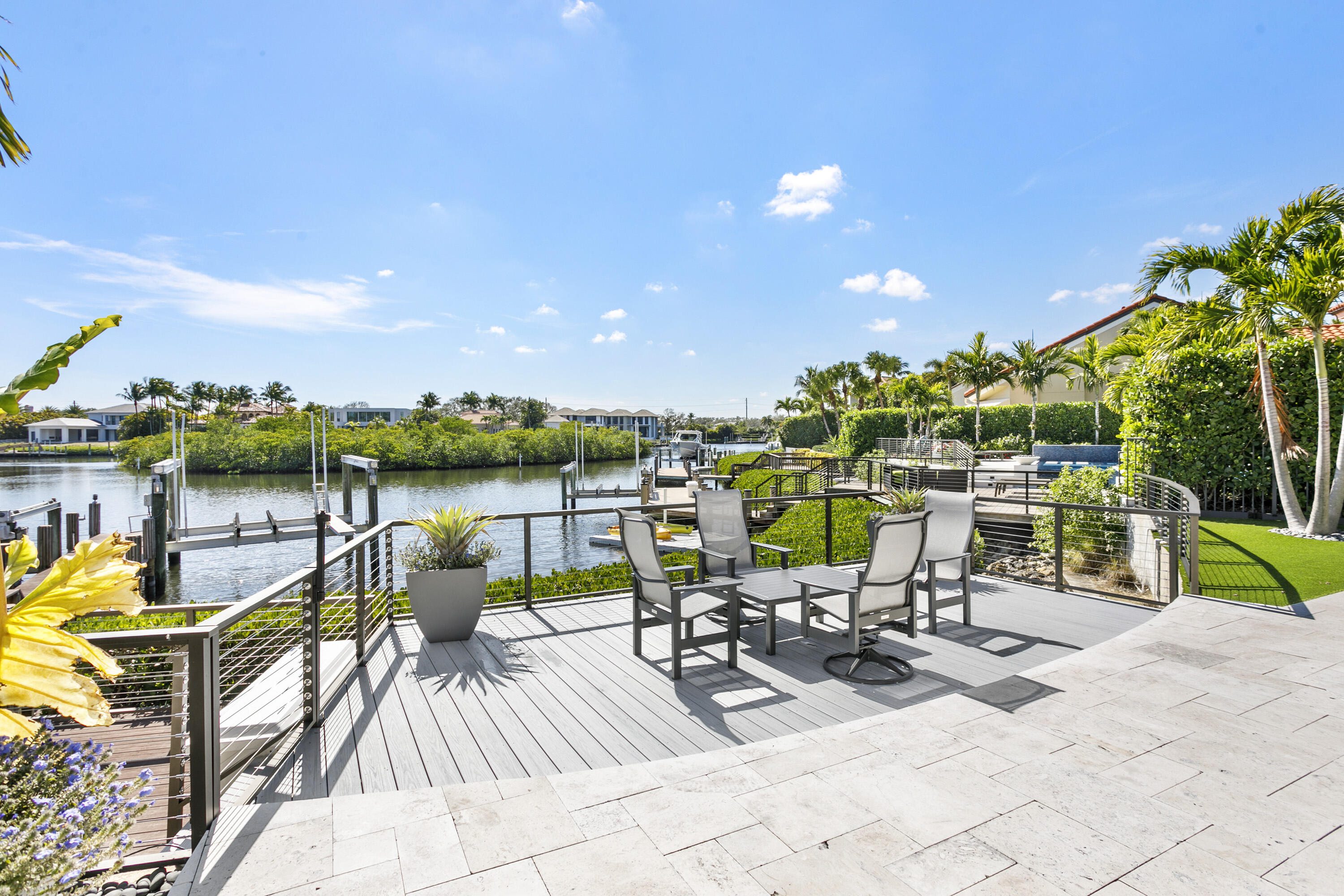 245 Regatta Drive Jupiter, FL 33477 - Photo 29 of 51 a view of a chairs and table on the terrace