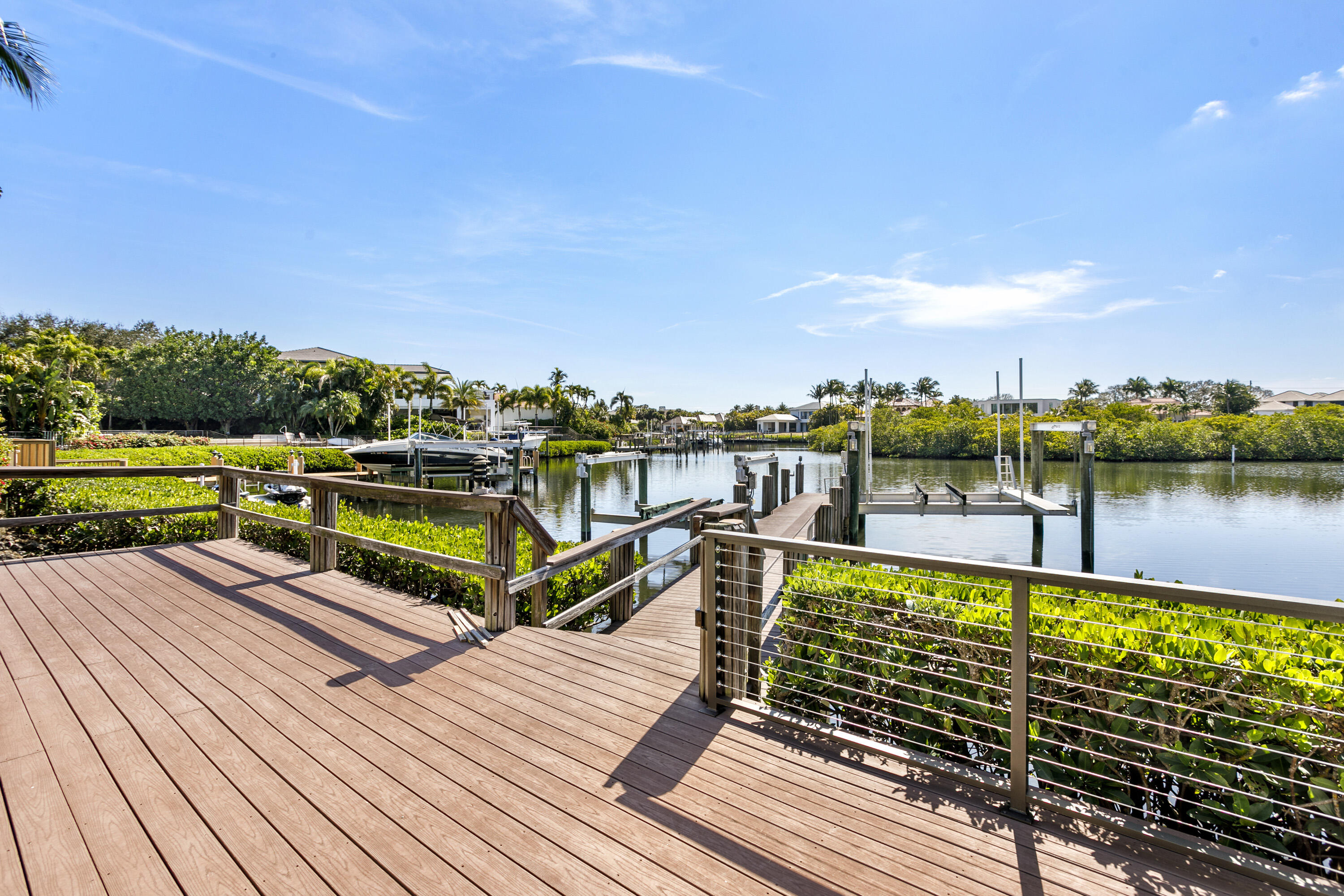 245 Regatta Drive Jupiter, FL 33477 - Photo 35 of 51 a view of a swimming pool with seating area