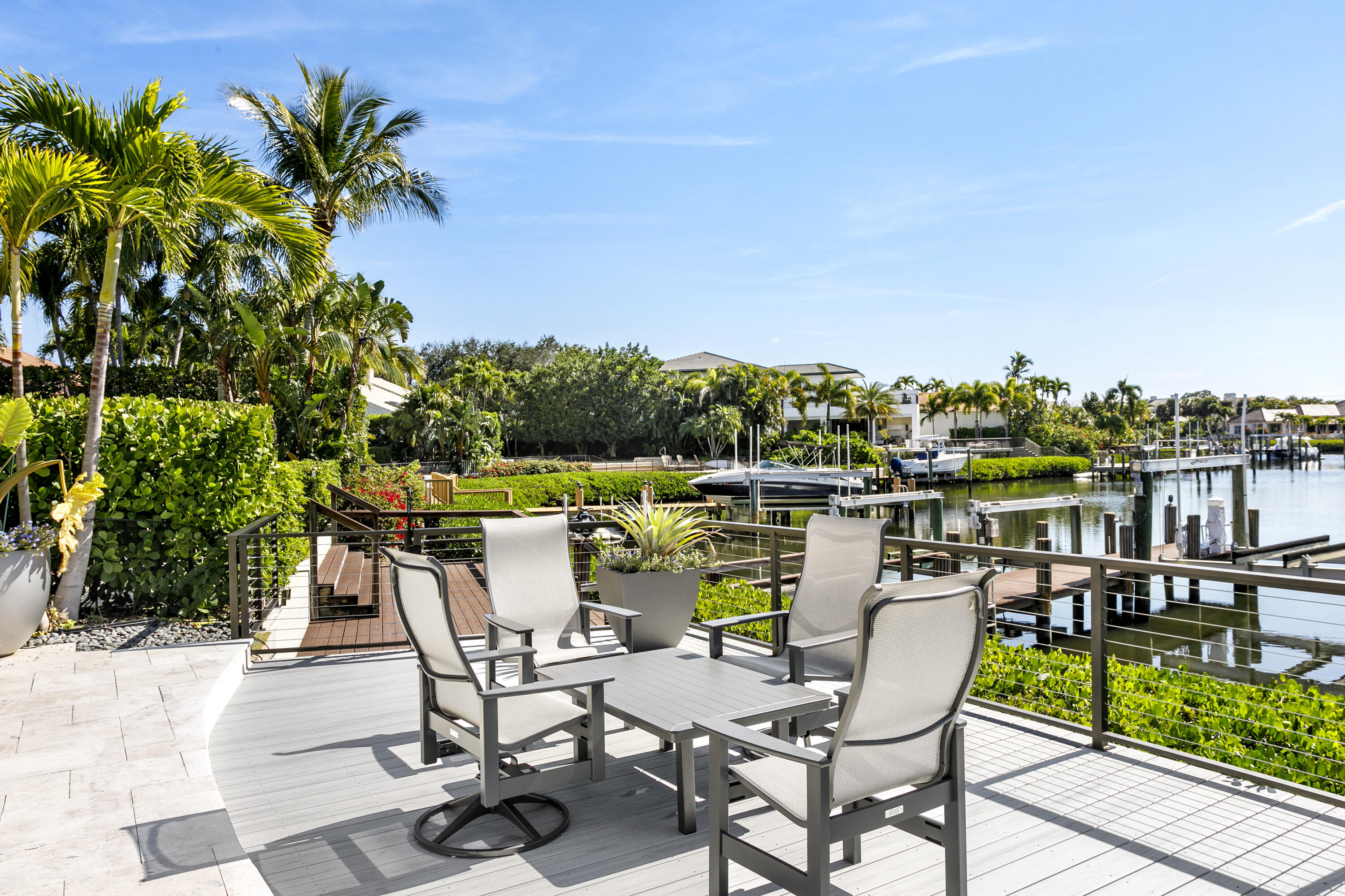 245 Regatta Drive Jupiter, FL 33477 - Photo 36 of 51 a view of a chairs and table in patio