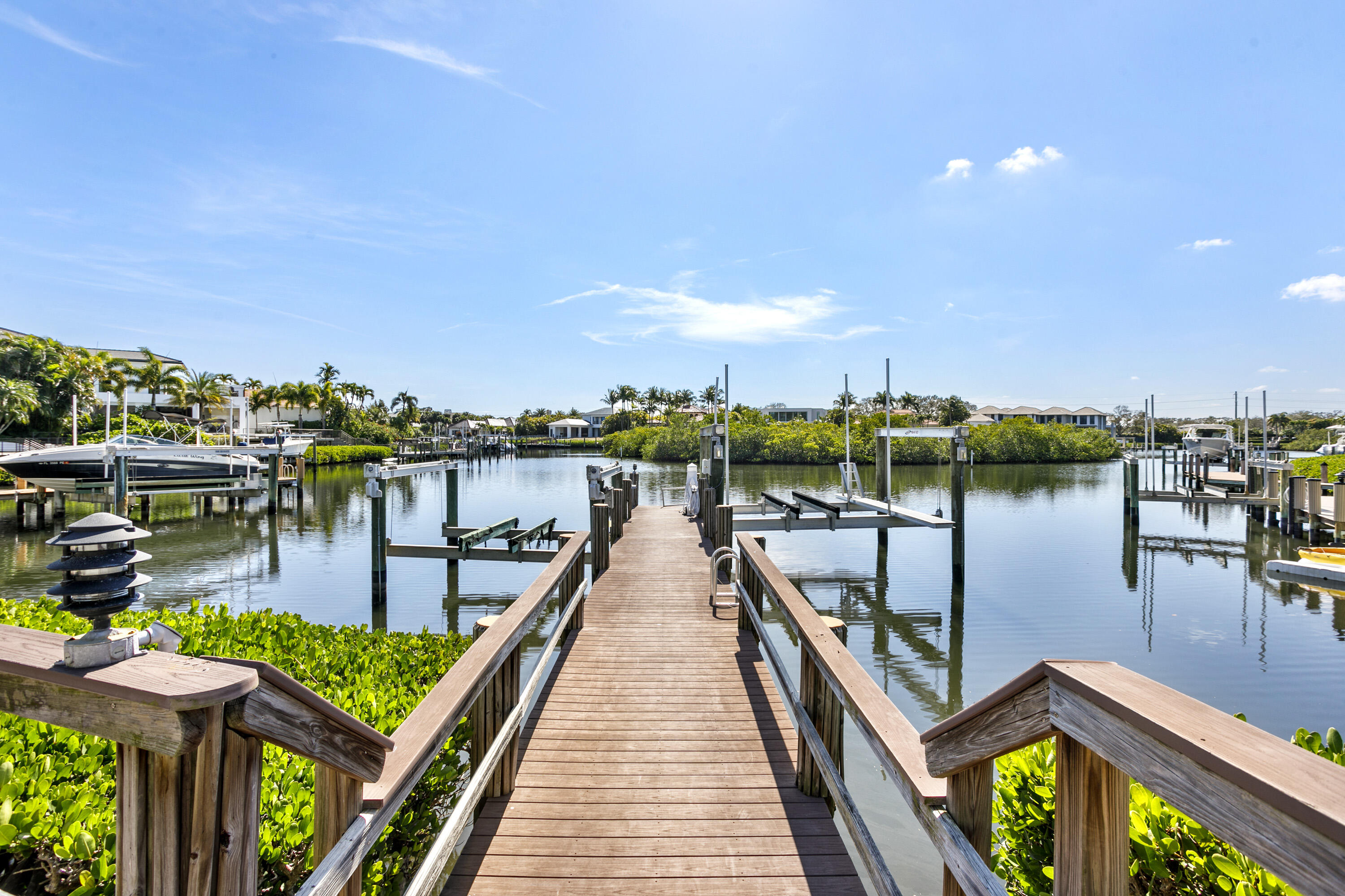 245 Regatta Drive Jupiter, FL 33477 - Photo 37 of 51 a view of a balcony with chairs