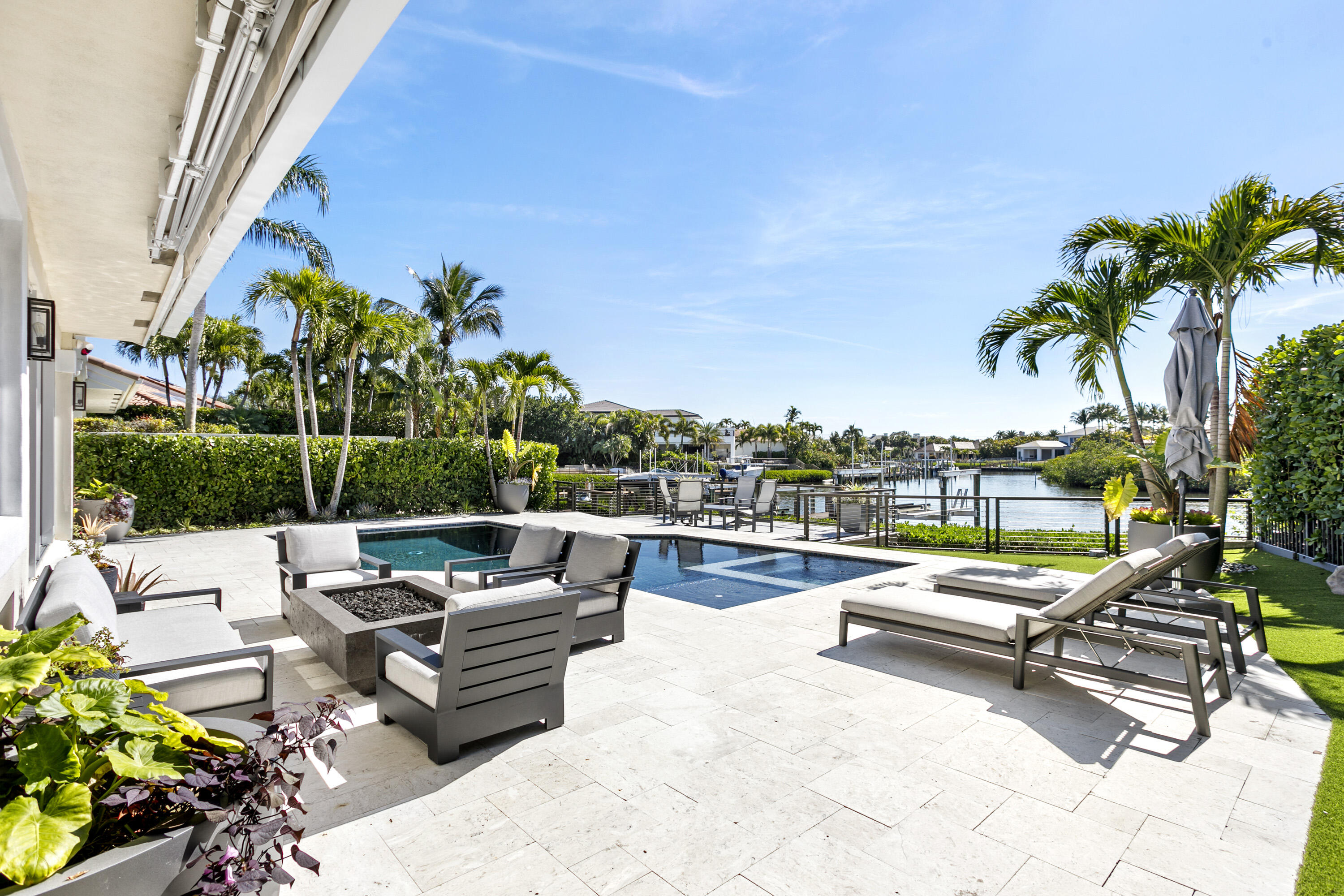 245 Regatta Drive Jupiter, FL 33477 - Photo 39 of 51 a view of swimming pool with lounge chairs
