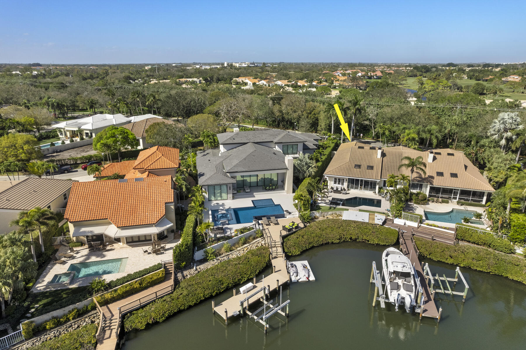 245 Regatta Drive Jupiter, FL 33477 - Photo 45 of 51 an aerial view of residential houses with outdoor space