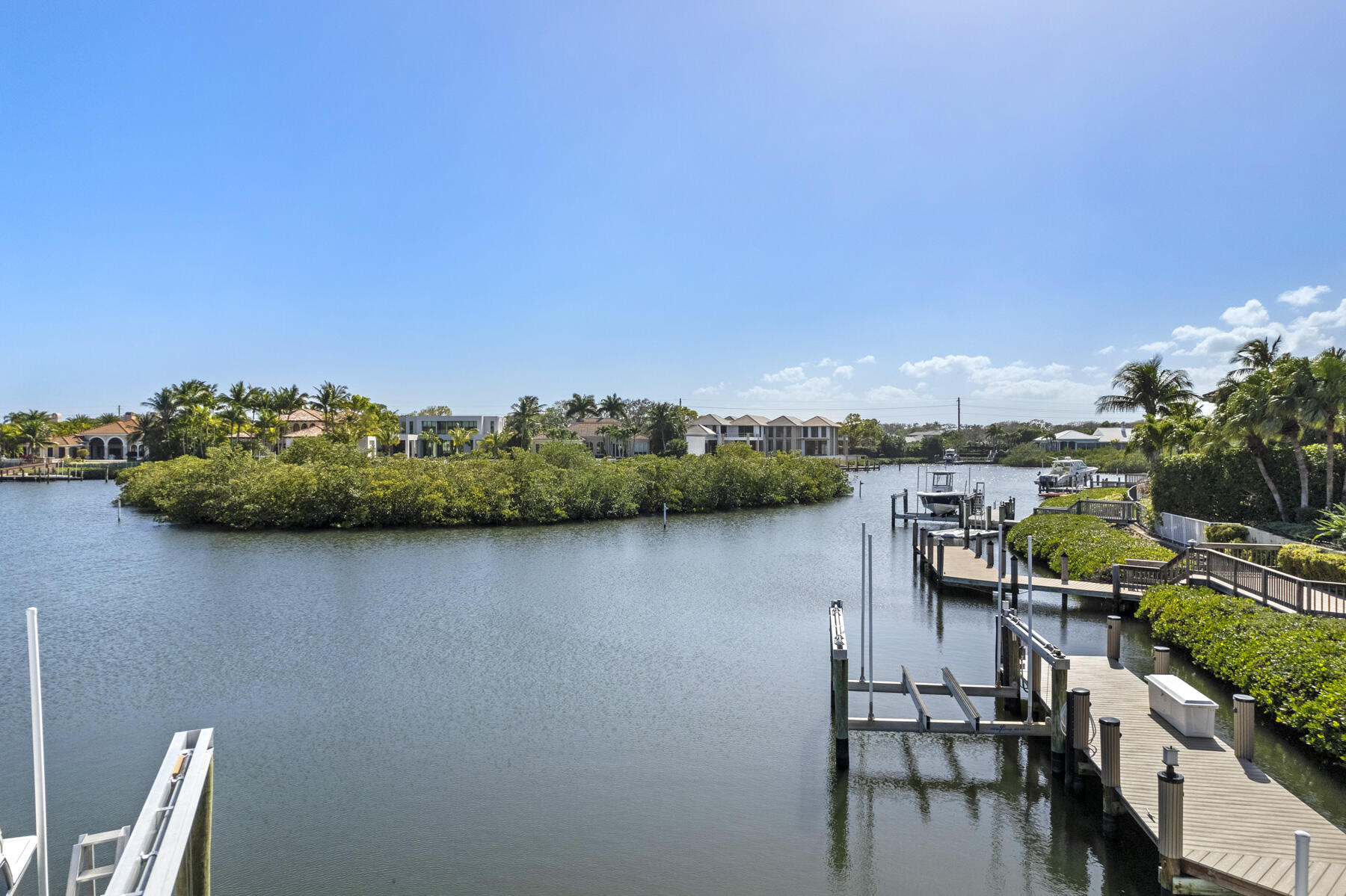 245 Regatta Drive Jupiter, FL 33477 - Photo 49 of 51 a view of a chairs and table in a terrace