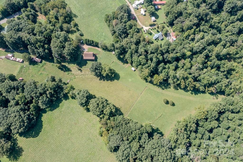 3346 Clarks Chapel Road Lenoir, NC 28645 - Photo 13 of 48 a view of a garden with a lake