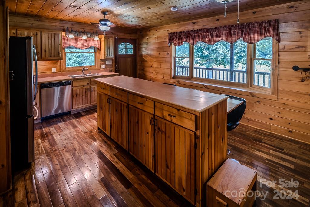 3346 Clarks Chapel Road Lenoir, NC 28645 - Photo 23 of 48 a view of a porch with wooden floor and outdoor seating