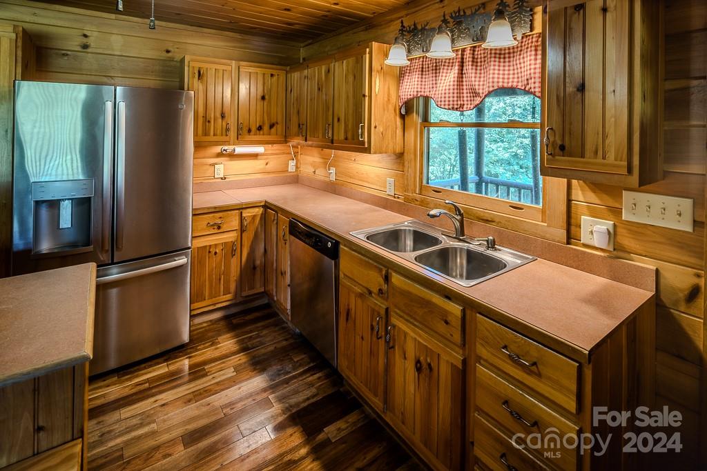 3346 Clarks Chapel Road Lenoir, NC 28645 - Photo 24 of 48 a kitchen that has a sink and a stove