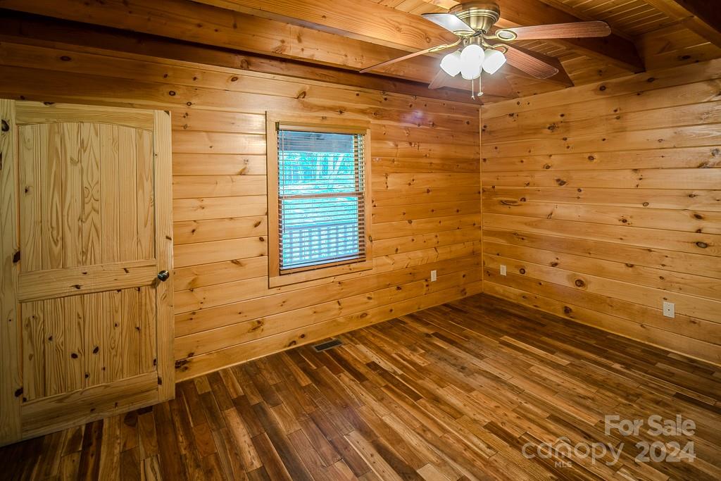 3346 Clarks Chapel Road Lenoir, NC 28645 - Photo 35 of 48 a view of a livingroom with wooden floor and a bathroom