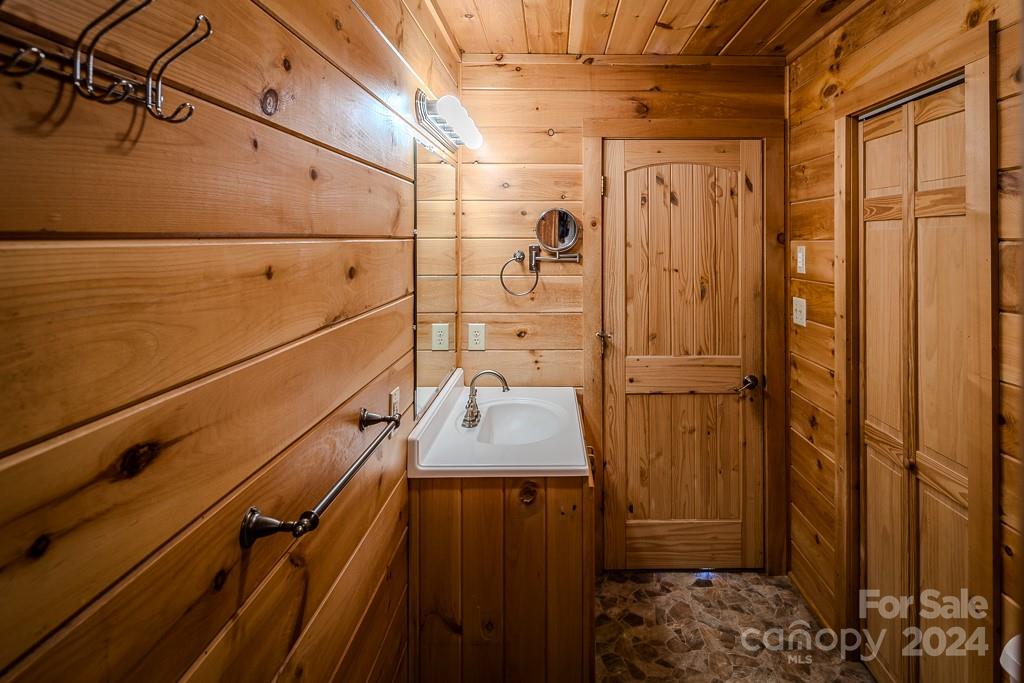 3346 Clarks Chapel Road Lenoir, NC 28645 - Photo 38 of 48 a bathroom with a shower and a sink