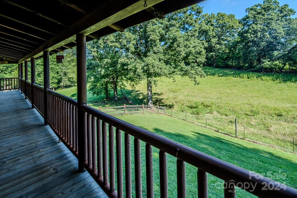 3346 Clarks Chapel Road Lenoir, NC 28645 - Photo 7 of 48 a view of a green field with wooden fence