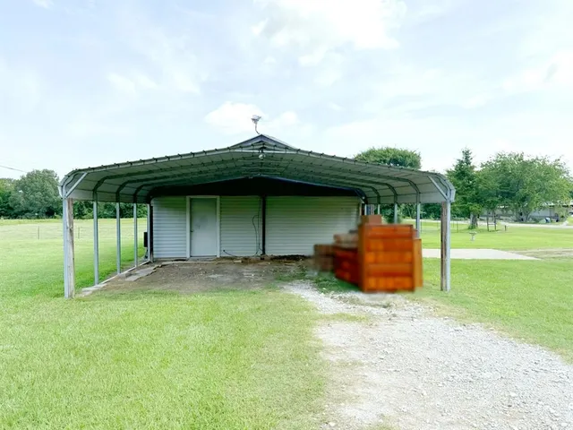 a front view of a house with yard