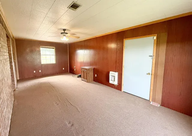 a view of a livingroom with a staircase
