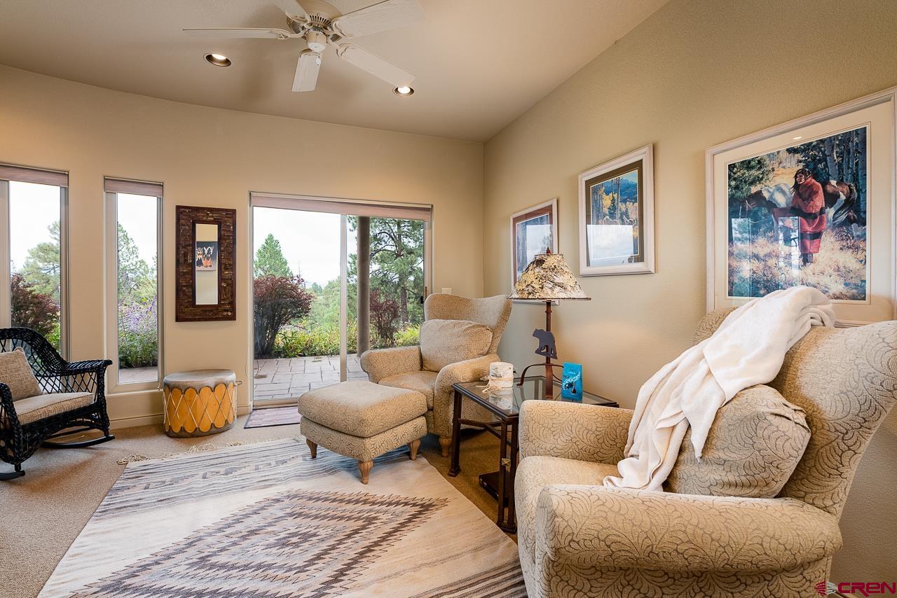 994 Cool Pines Drive Pagosa Springs, CO 81147 - Photo 30 of 35 a living room with furniture and a large window