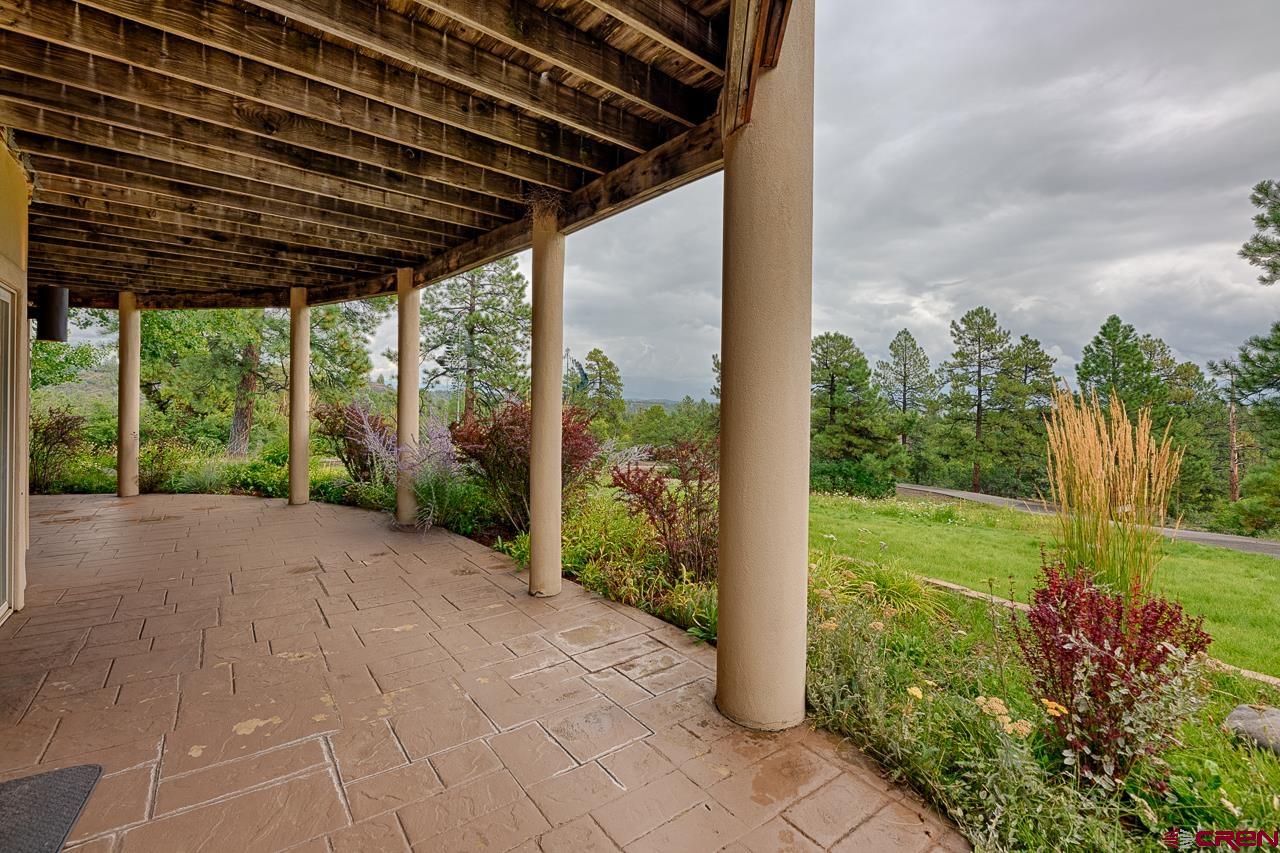 994 Cool Pines Drive Pagosa Springs, CO 81147 - Photo 34 of 35 a view of a backyard with garden