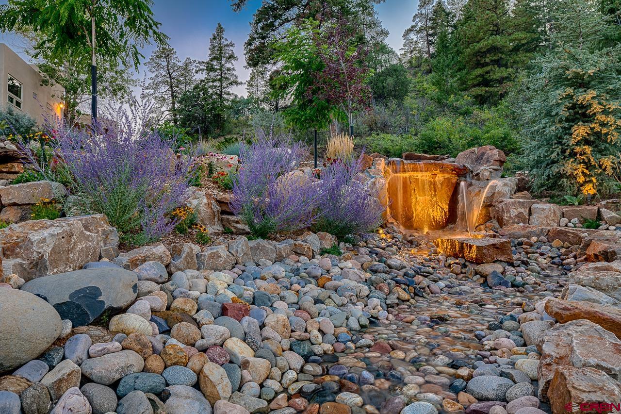 994 Cool Pines Drive Pagosa Springs, CO 81147 - Photo 35 of 35 a view of a backyard with plants and garden