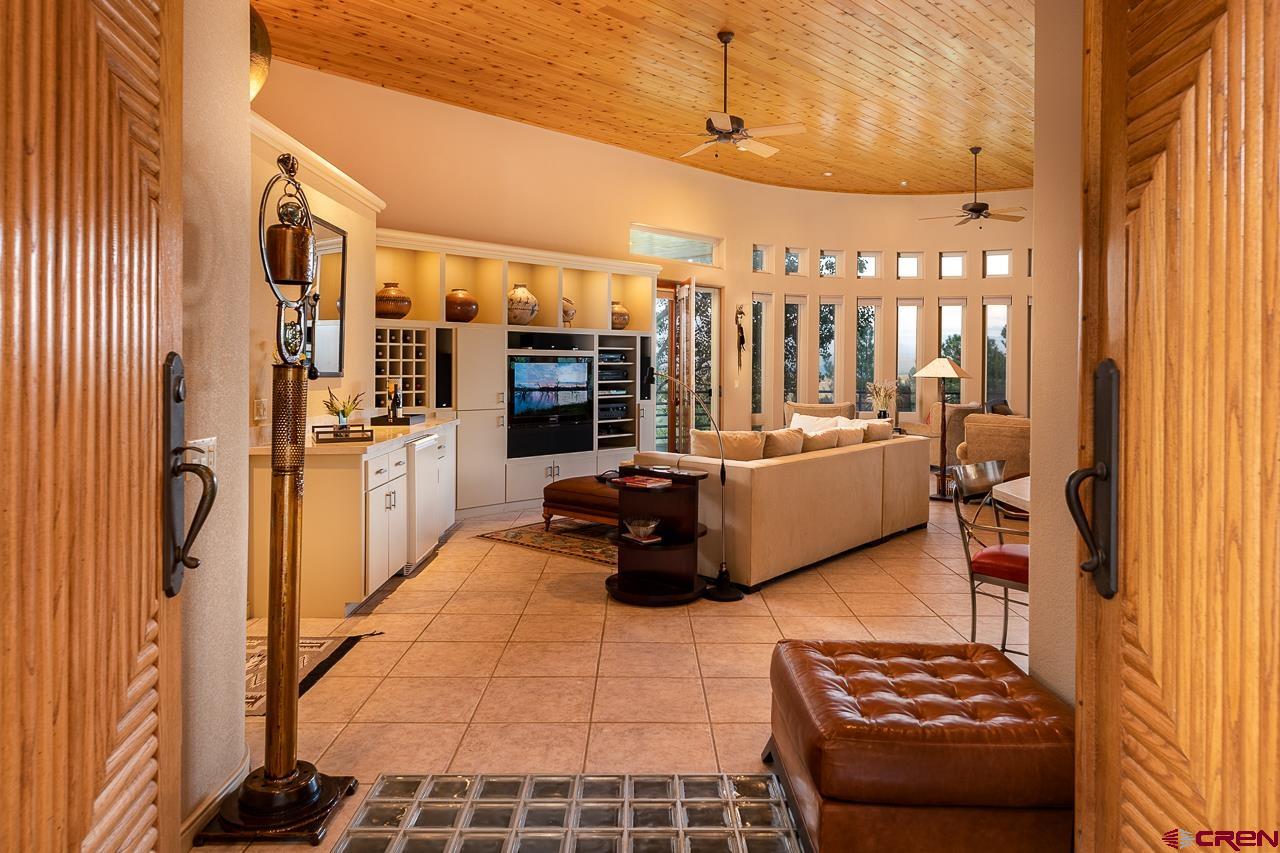 994 Cool Pines Drive Pagosa Springs, CO 81147 - Photo 9 of 35 a bedroom with furniture and a rug