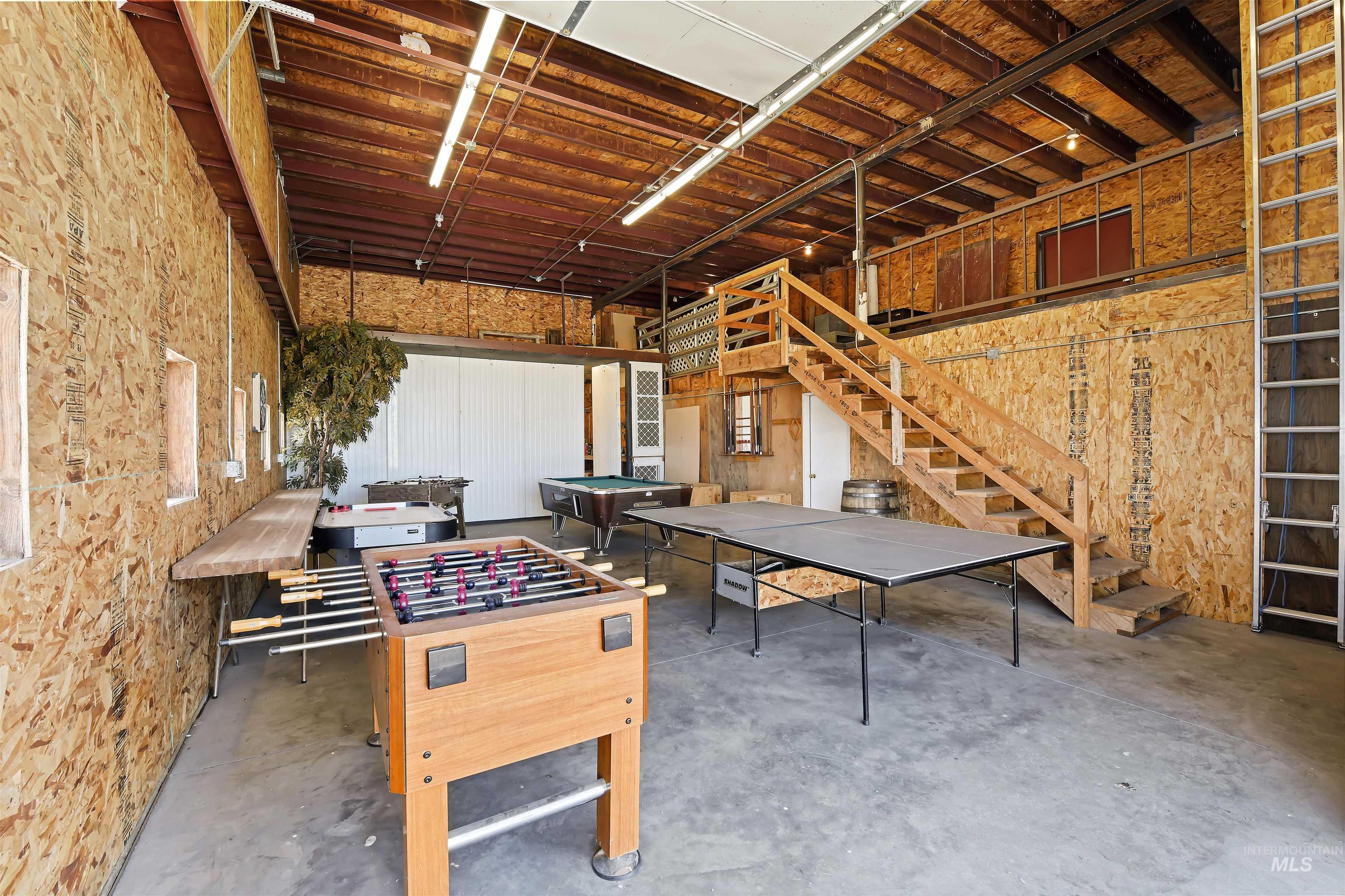 19234 Top Road Caldwell, ID 83607 - Photo 33 of 50 Rec room with unfinished concrete flooring