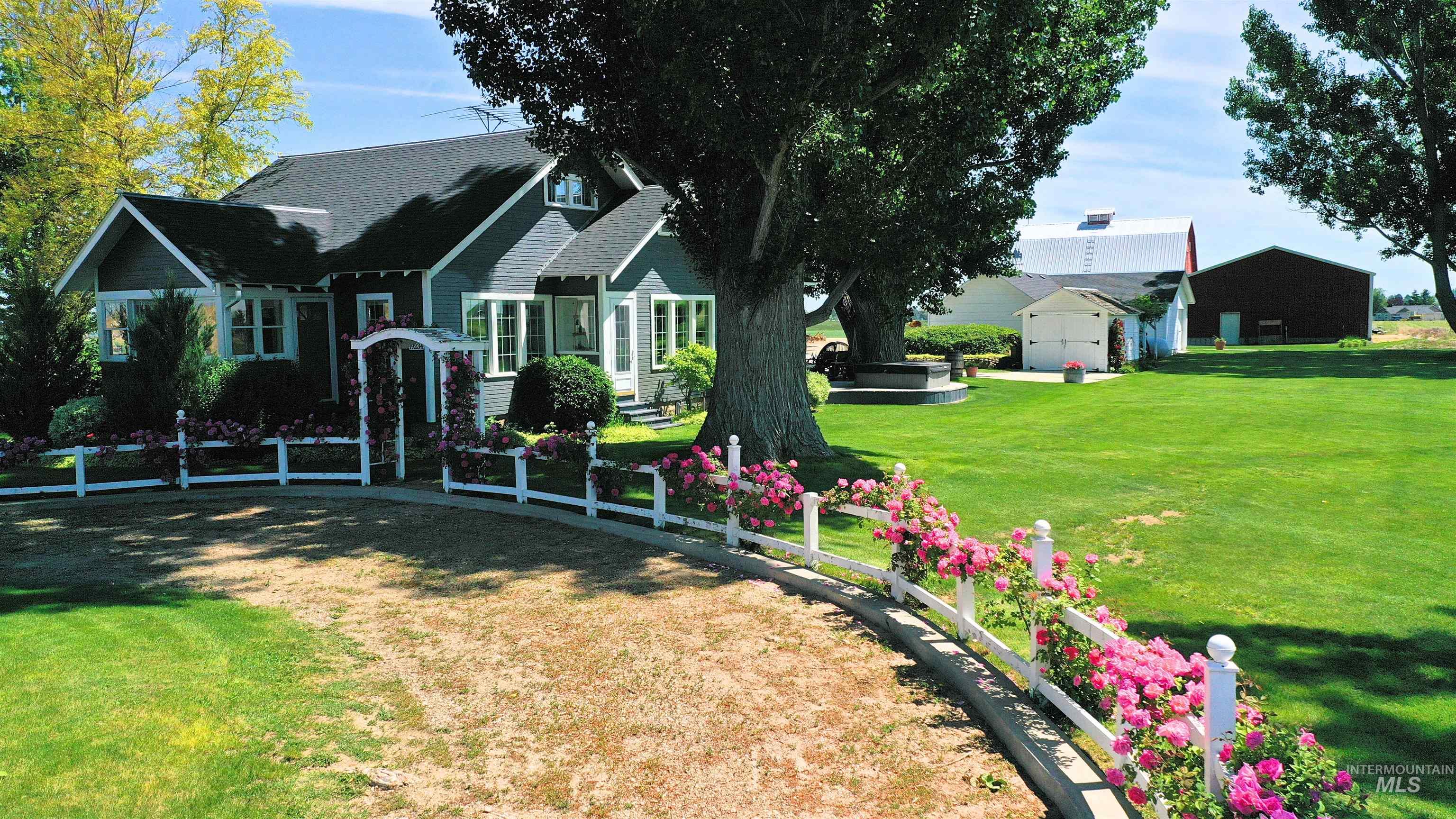 19234 Top Road Caldwell, ID 83607 - Photo 40 of 50 View of green lawn with an outdoor structure