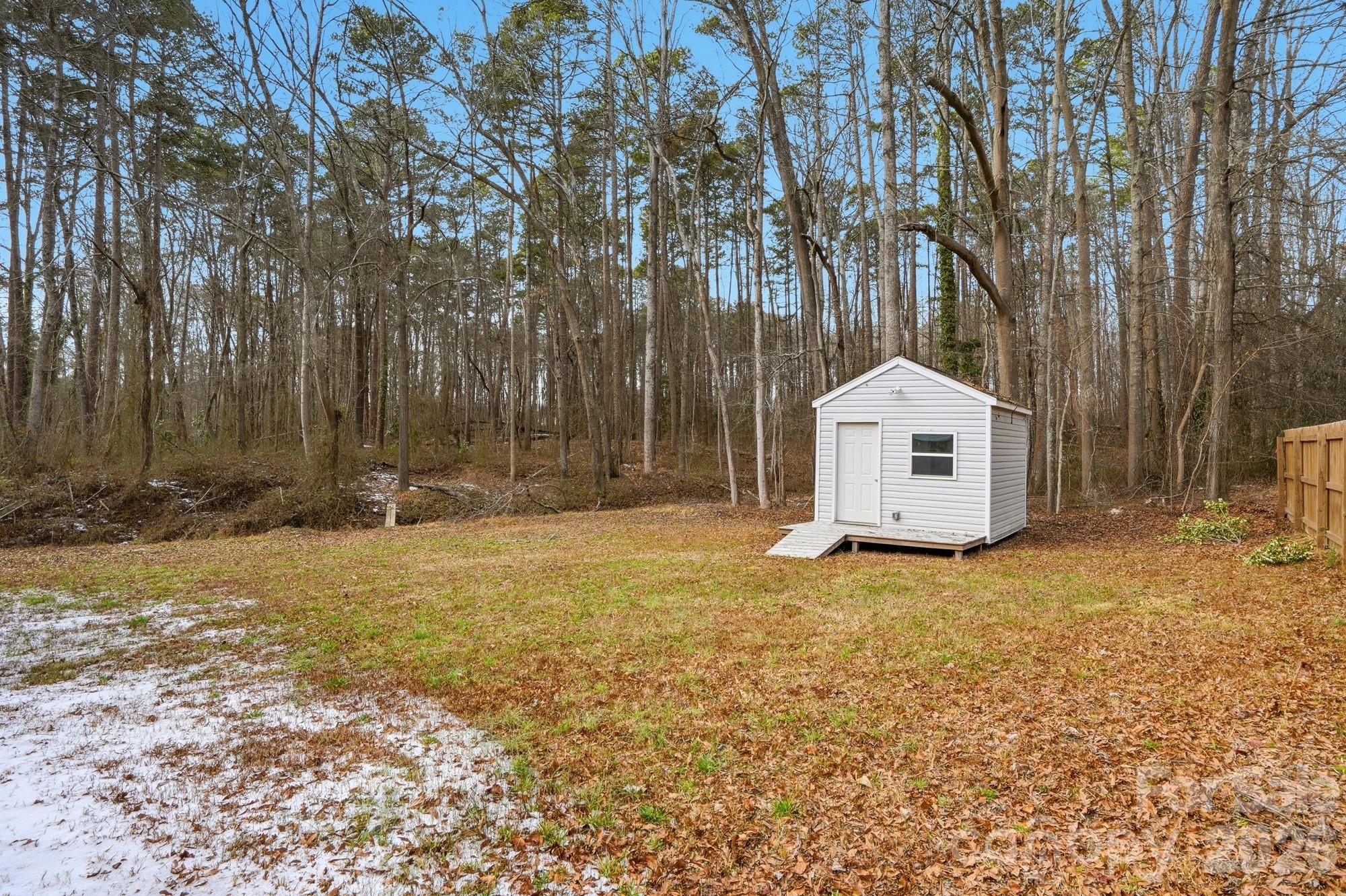 0 West Border Street Dallas, NC 28034 - Photo 7 of 21 a view of a house with backyard and tree