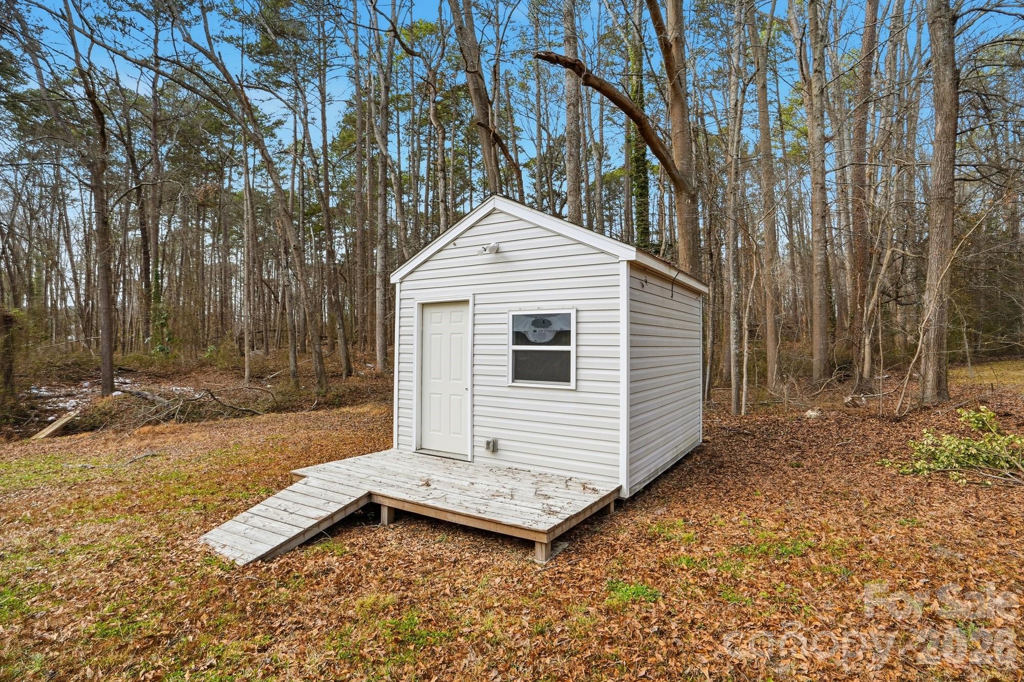 0 West Border Street Dallas, NC 28034 - Photo 8 of 21 a view of a house with a yard