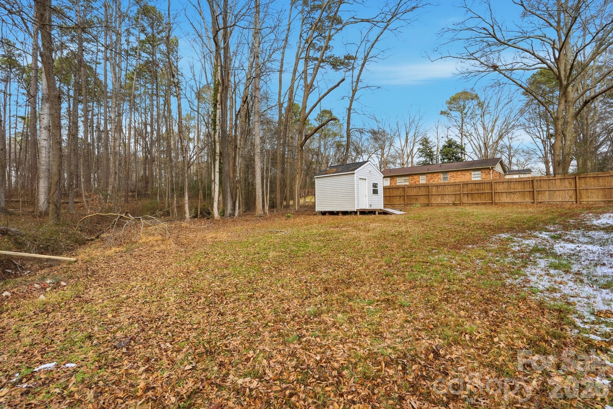 0 West Border Street Dallas, NC 28034 - Photo 10 of 21 a front view of a house with a yard