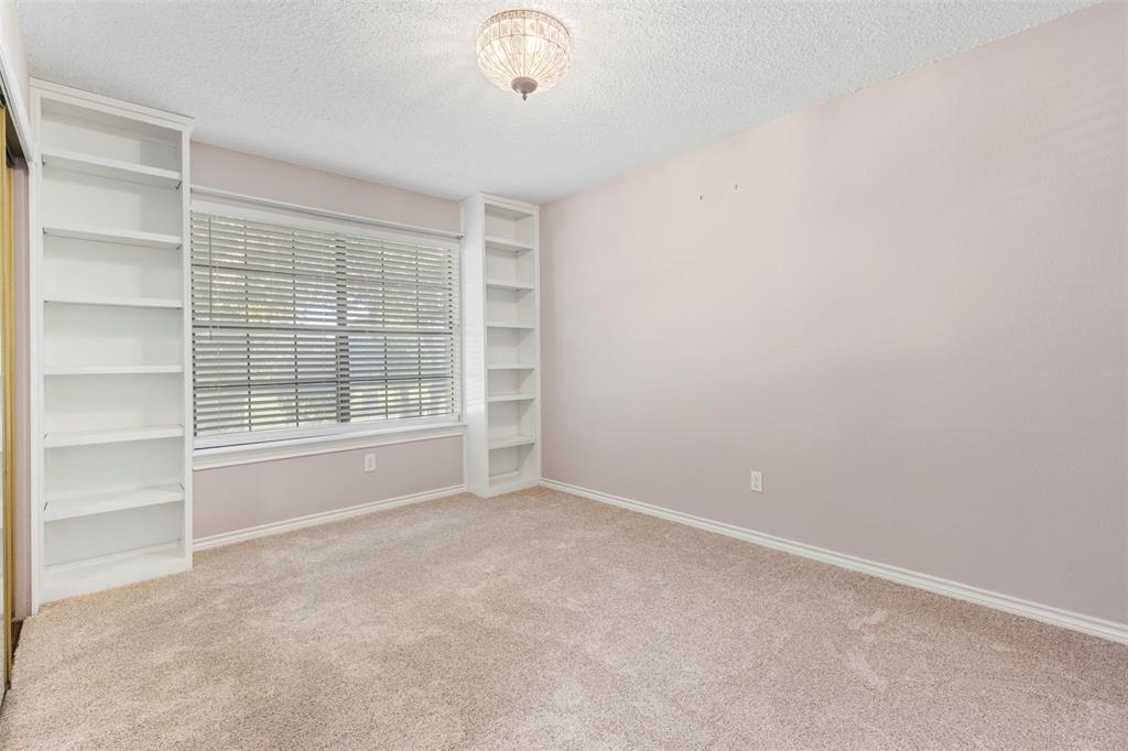 6905 Rochelle Drive Plano, TX 75023 - Photo 16 of 23 a view of an empty room with a window