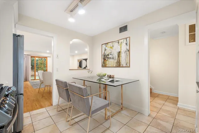 a view of a livingroom with furniture and window
