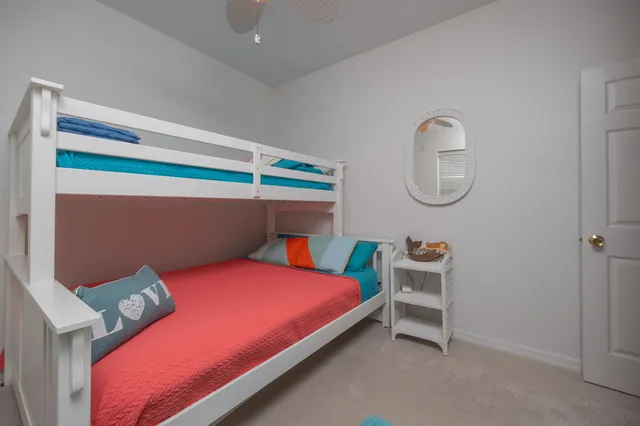 a bed room with a bed and a window