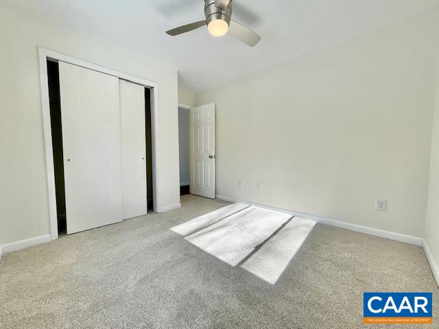 6232 Howardsville Road Dillwyn, VA 23936 - Photo 27 of 35 an empty room with a ceiling fan