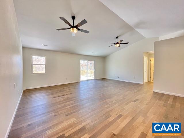 6232 Howardsville Road Dillwyn, VA 23936 - Photo 4 of 35 a view of an empty room with a window and wooden floor