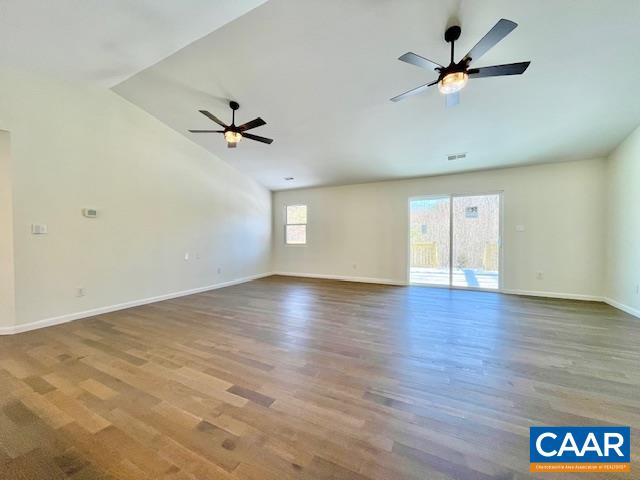 6232 Howardsville Road Dillwyn, VA 23936 - Photo 5 of 35 wooden floor in an empty room with a window