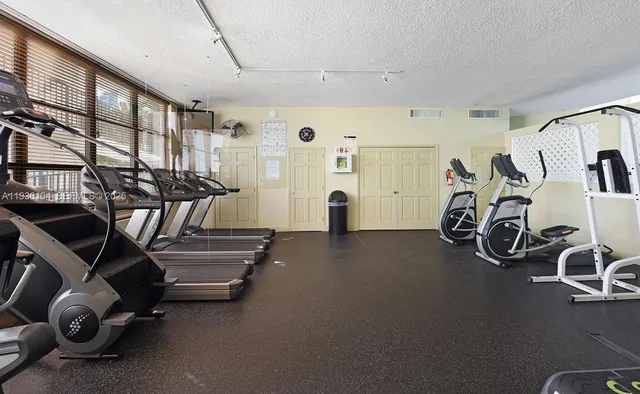 a view of a room with gym equipment